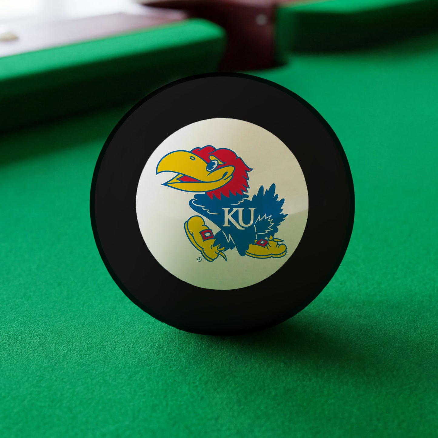 Official Kansas-Jayhawks-Pool-8-Ball Collegiate 8-Ball Lined Up on Green Felt Pool Table Surface with Billiard Ball Rack