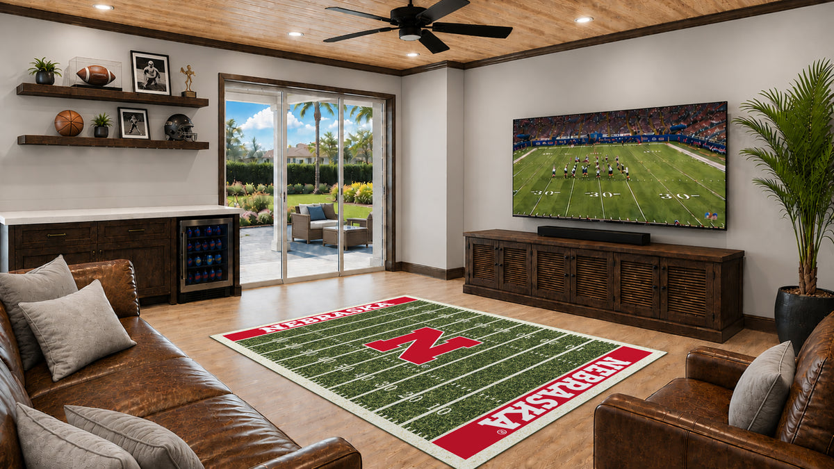 Nebraska Cornhuskers Homefield Rug in Room Setting - Officially Licensed NCAA Area Rug
