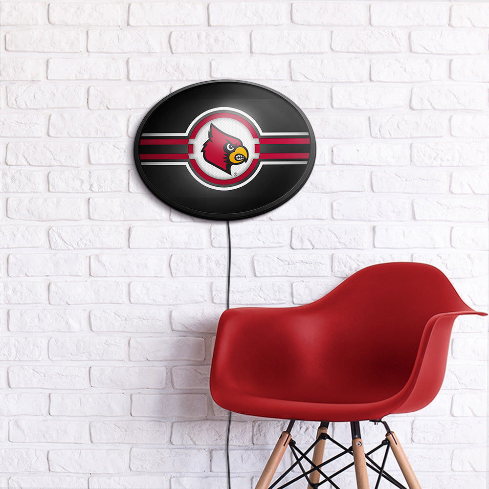 Louisville Cardinals Slimline Oval Lighted Wall Sign Room View