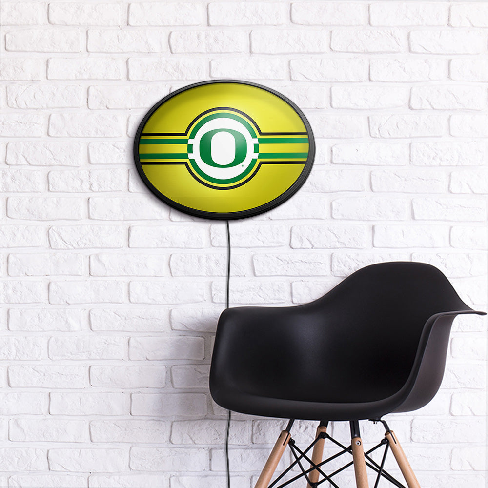 Oregon Ducks Slimline Oval Lighted Wall Sign Room View