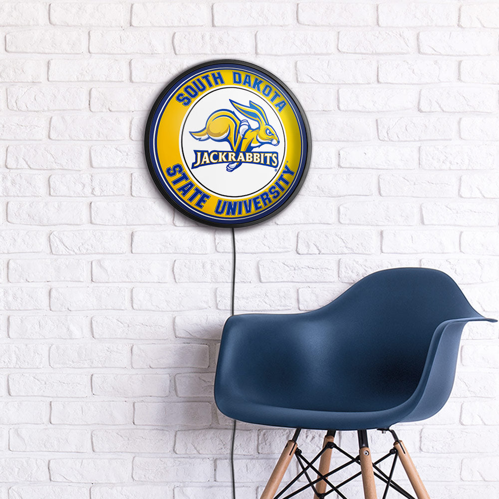 South Dakota State JackRabbits Slimline Round Lighted Wall Sign Room View
