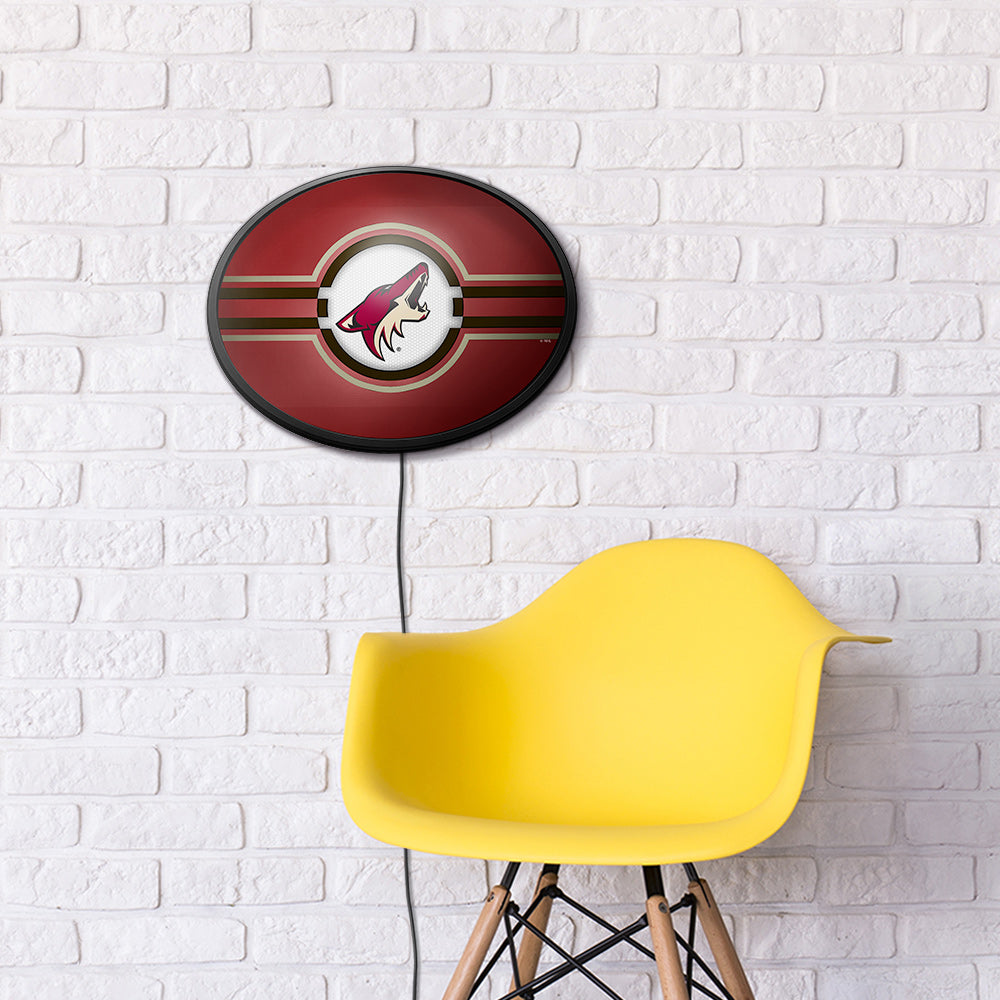 Arizona Coyotes Slimline Oval Lighted Wall Sign Room View
