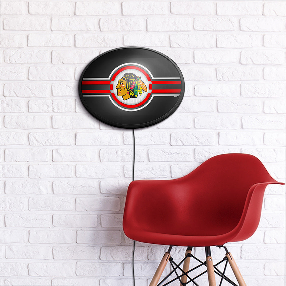 Chicago Blackhawks Slimline Oval Lighted Wall Sign Room View