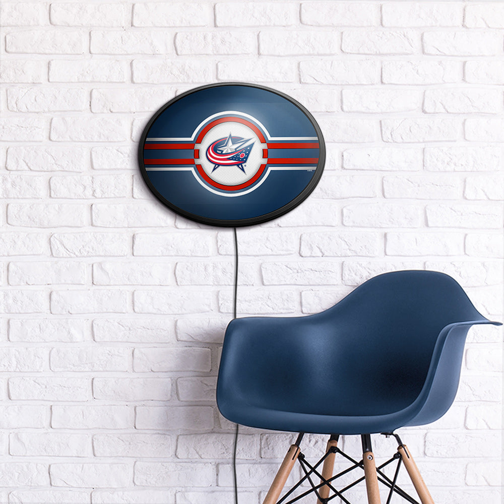 Columbus Blue Jackets Slimline Oval Lighted Wall Sign Room View