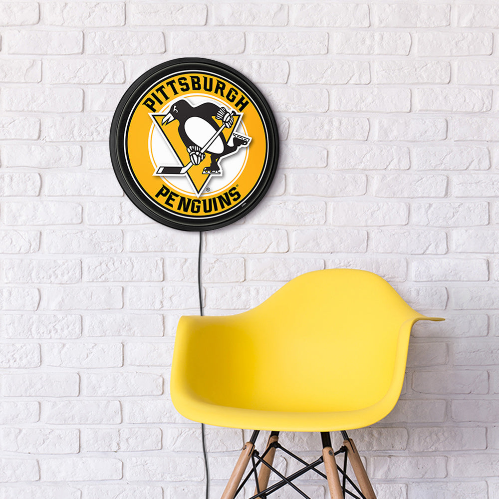 Pittsburgh Penguins Slimline Round Lighted Wall Sign Room View