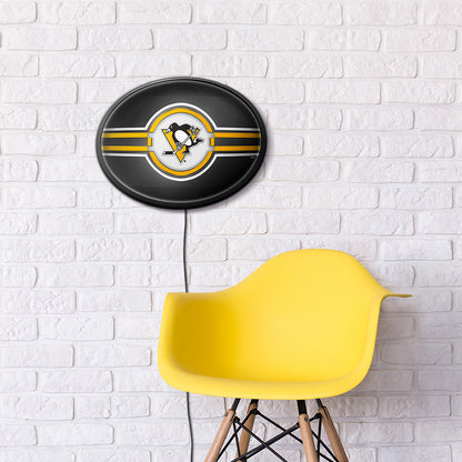 Pittsburgh Penguins Slimline Oval Lighted Wall Sign Room View