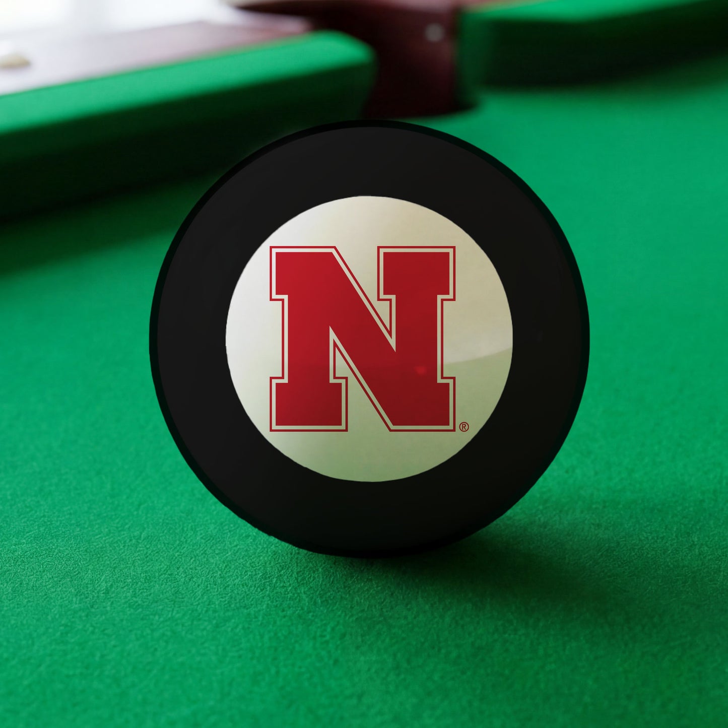 Official Nebraska-Cornhuskers-Pool-8-Ball Collegiate 8-Ball Lined Up on Green Felt Pool Table Surface with Billiard Ball Rack