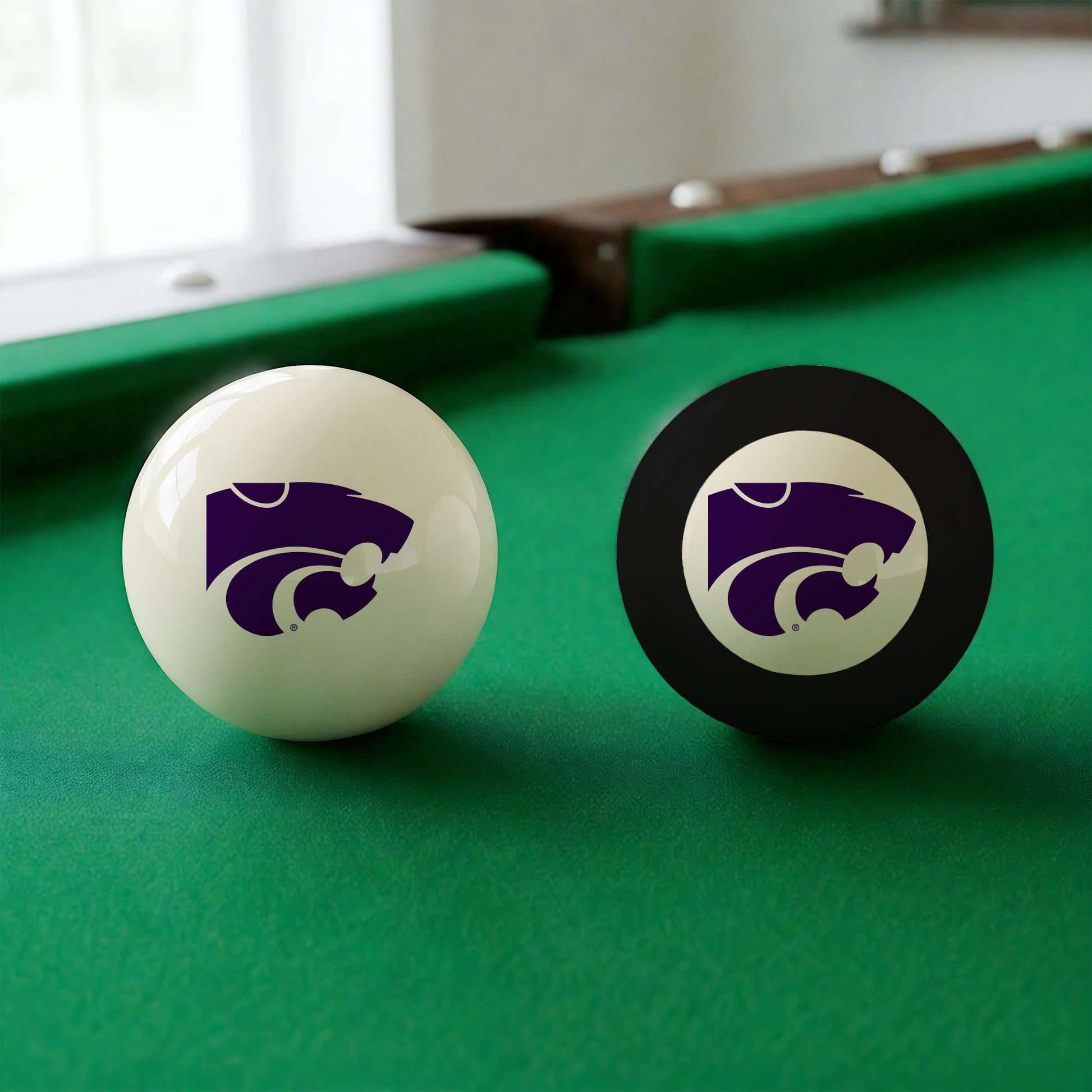 Official Kansas-State-Wildcats-Pool-Cue-8-Ball-Set College Cue Ball and 8-Ball Set Displayed Together on Green Felt Pool Table Surface