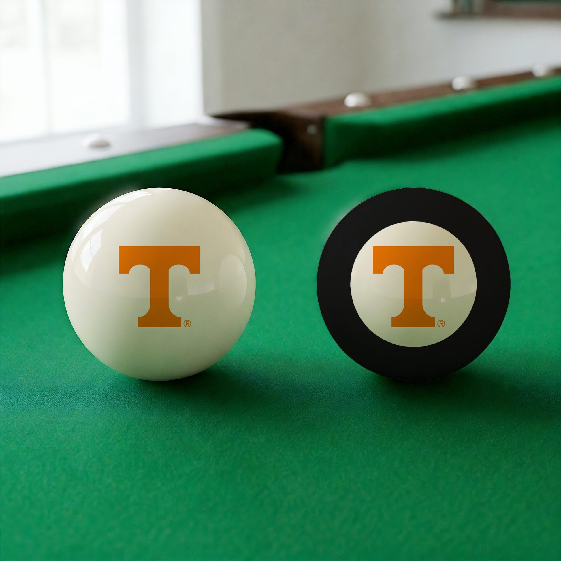 Official Tennessee-Volunteers-Pool-Cue-8-Ball-Set College Cue Ball and 8-Ball Set Displayed Together on Green Felt Pool Table Surface