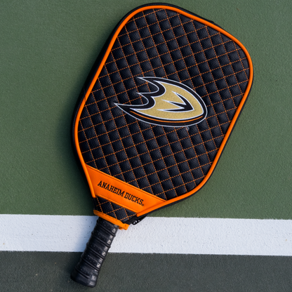 Anaheim Ducks quilted pickleball paddle cover on court view