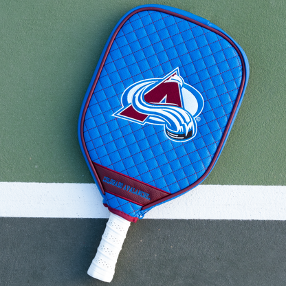 Colorado Avalanche Blue quilted pickleball paddle cover on court