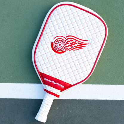 Detroit Red Wings White quilted pickleball paddle cover on court