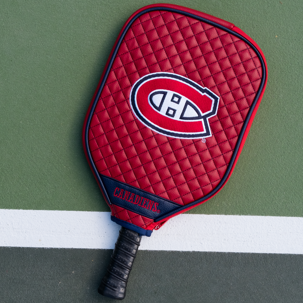 Montreal Canadiens quilted pickleball paddle cover on court view