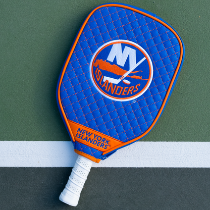 New York Islanders Blue quilted pickleball paddle cover on court