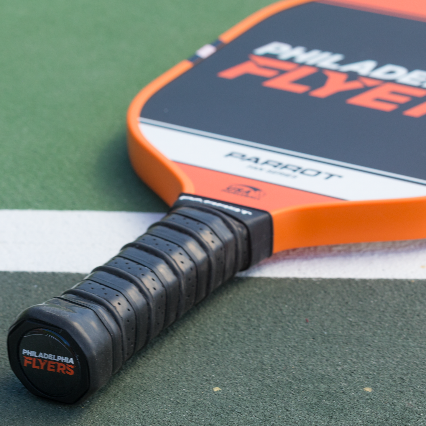 Philadelphia Flyers Sport Plus pickleball paddle back view on the court
