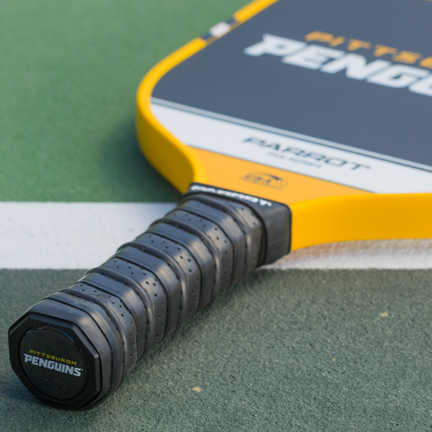 Pittsburgh Penguins Sport Plus pickleball paddle back view on the court