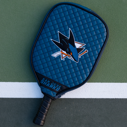 San Jose Sharks Teal quilted pickleball paddle cover on court
