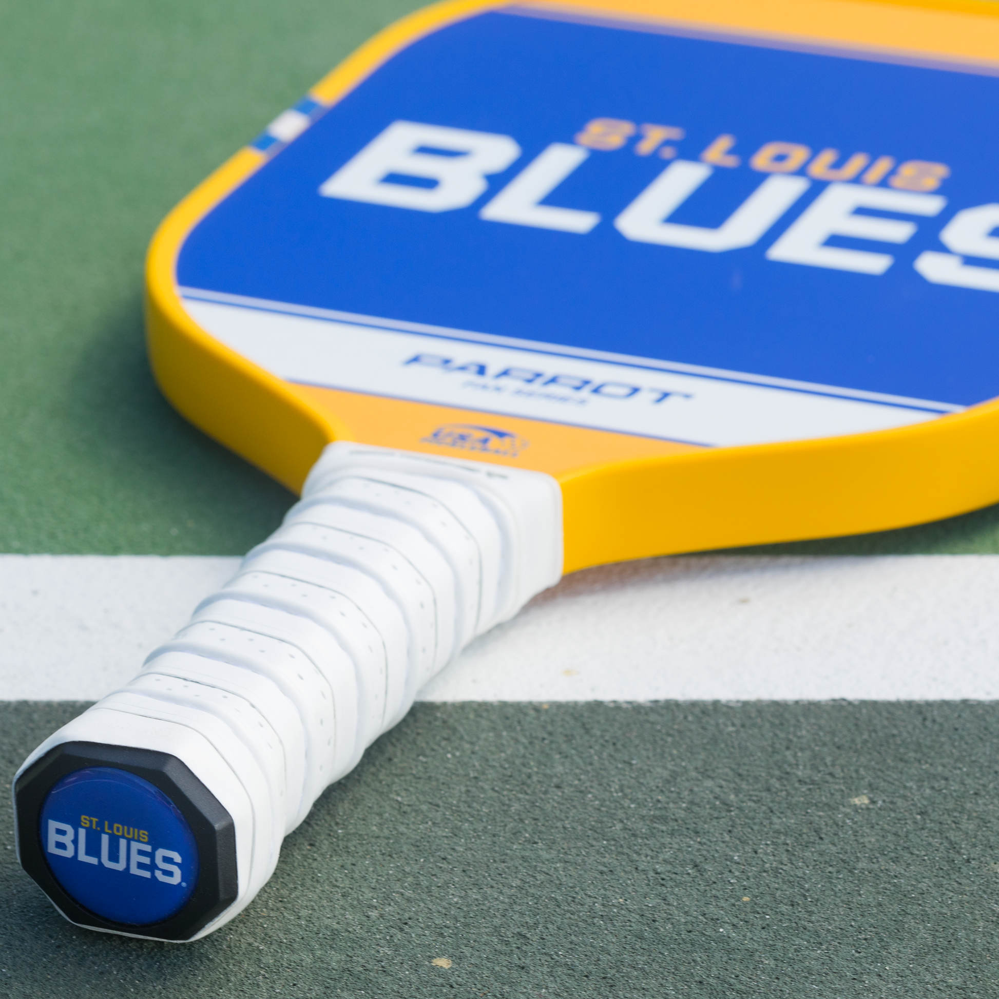 St Louis Blues Sport Plus pickleball paddle back view on the court
