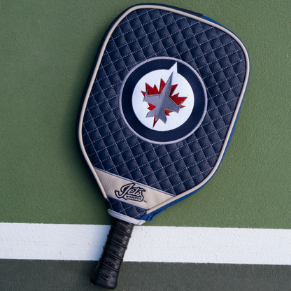 Winnipeg Jets quilted pickleball paddle cover on court view