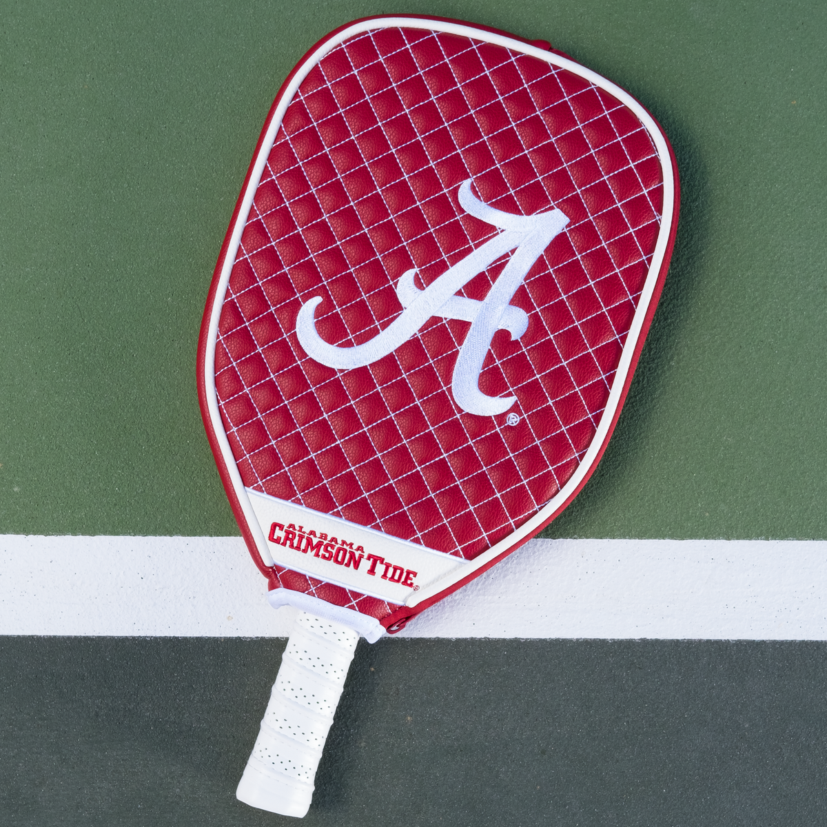Alabama Crimson Tide Dark Red quilted pickleball paddle cover on court