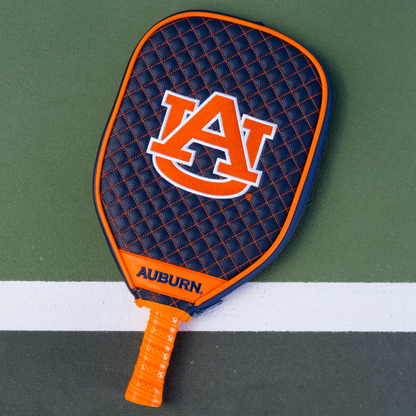 Auburn Tigers Navy quilted pickleball paddle cover on court