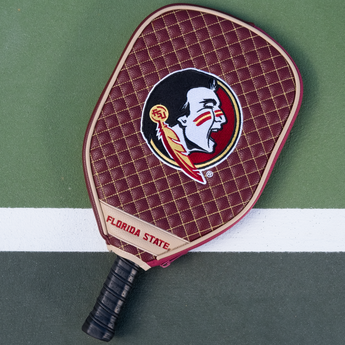 Florida State Seminoles quilted pickleball paddle cover on court view