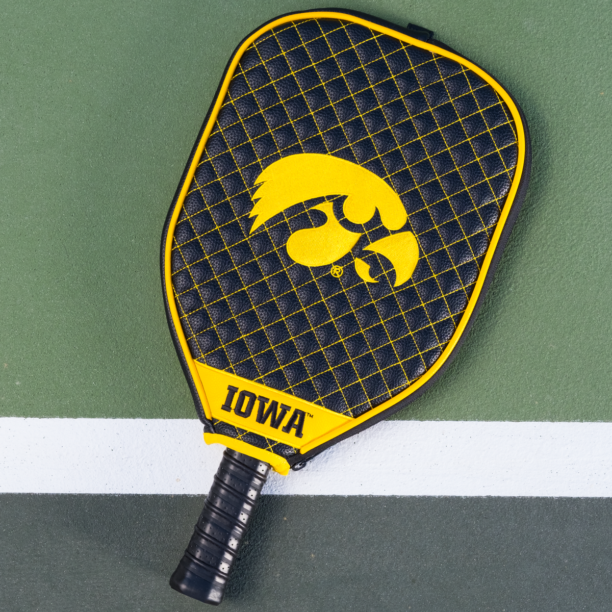 Iowa Hawkeyes quilted pickleball paddle cover on court view