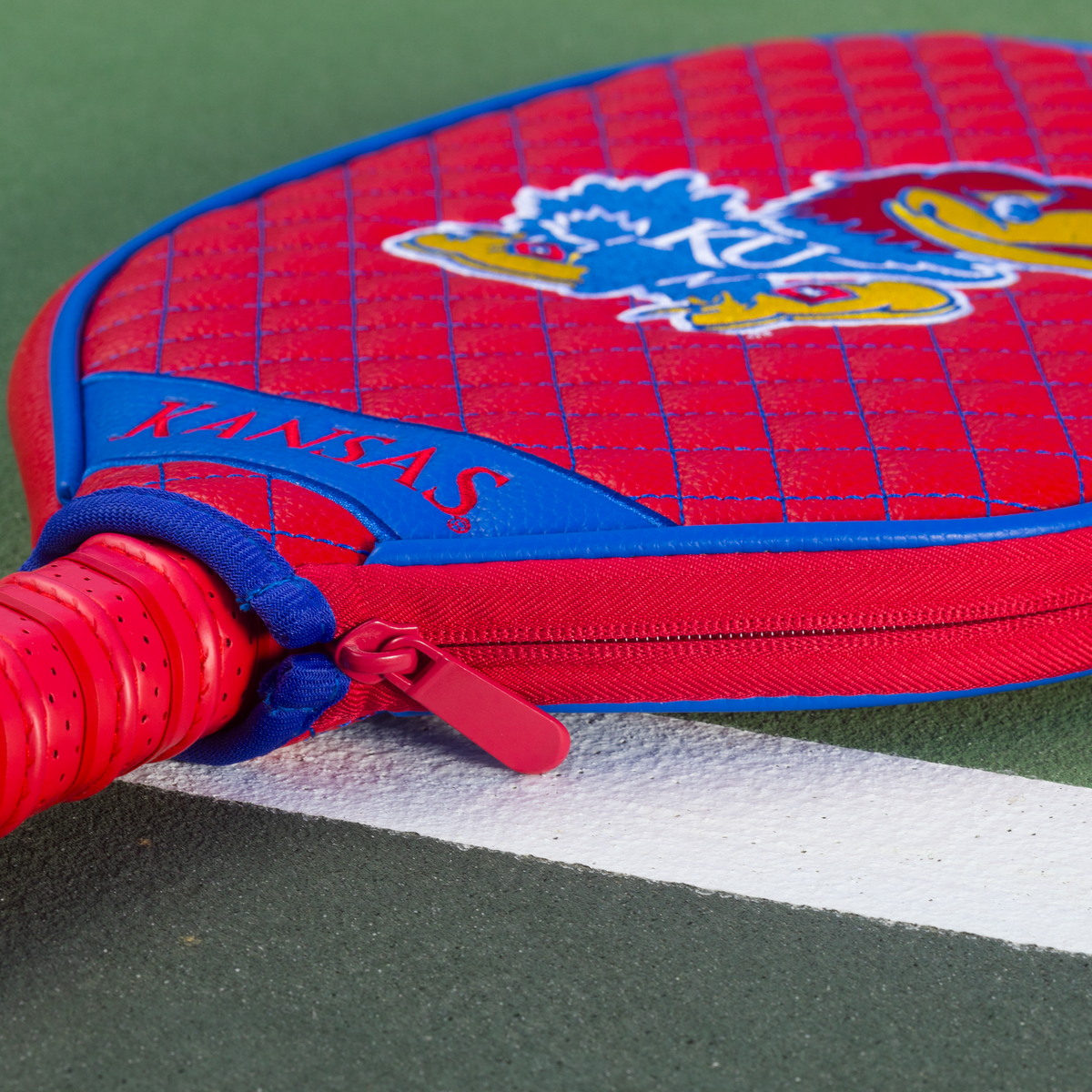 Kansas Jayhawks Red quilted pickleball paddle cover closeup image