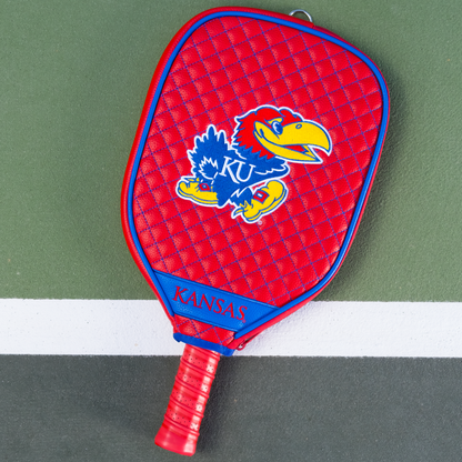 Kansas Jayhawks Red quilted pickleball paddle cover on court