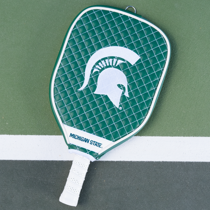 Michigan State Spartans quilted pickleball paddle cover on court view