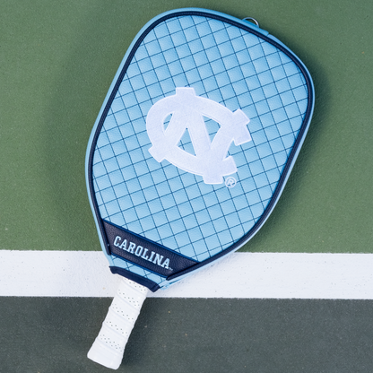 North Carolina Tar Heels quilted pickleball paddle cover on court view