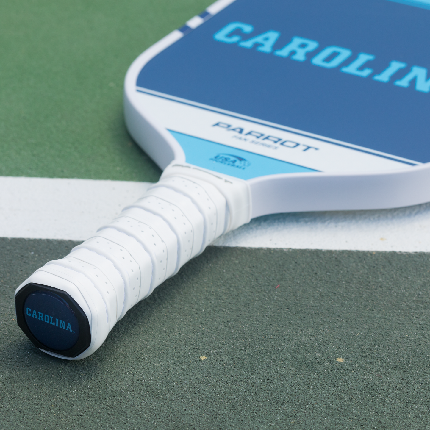 North Carolina Tar Heels Sport Plus pickleball paddle on the court