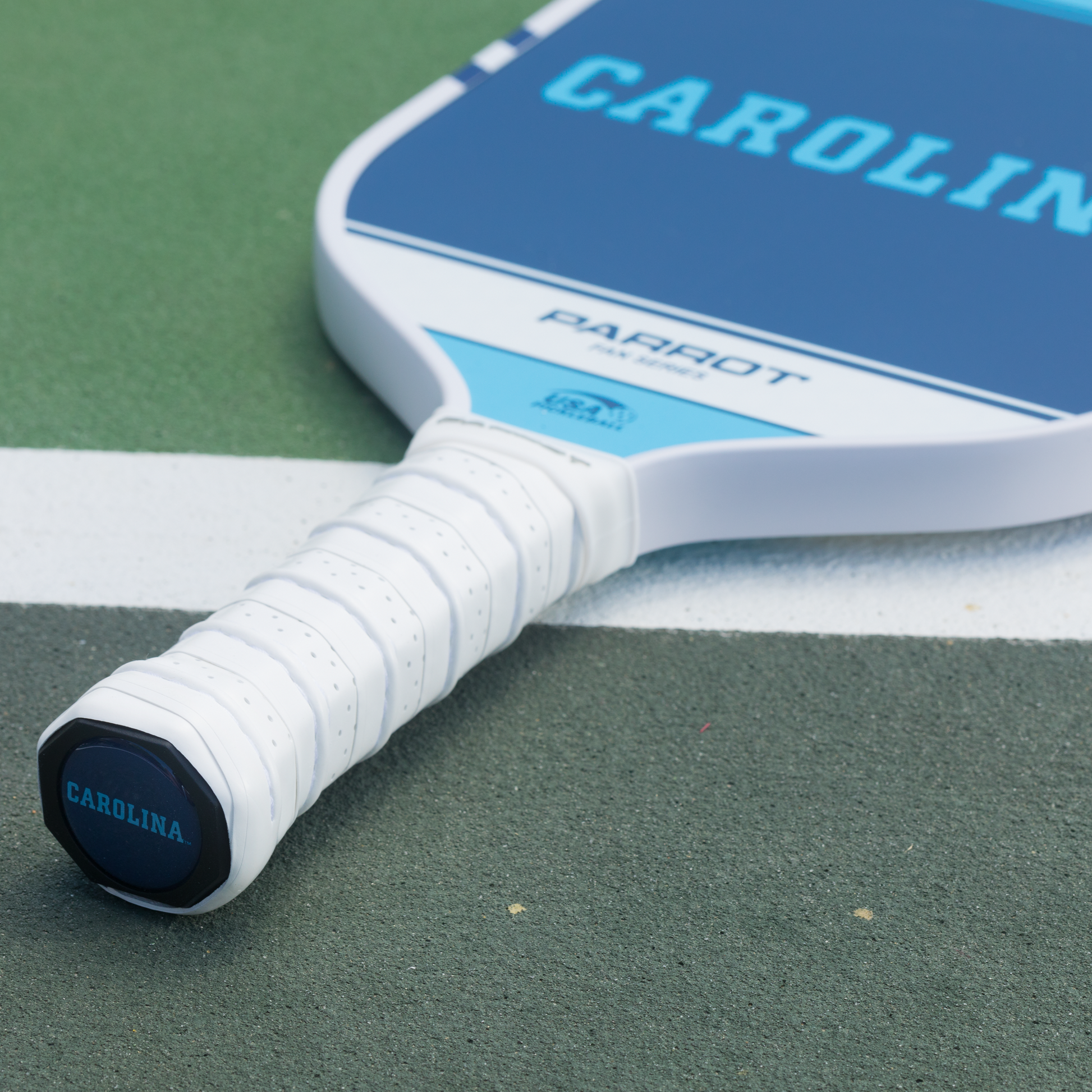 North Carolina Tar Heels Sport Plus pickleball paddle on the court