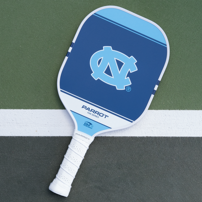 North Carolina Tar Heels Sport Plus pickleball paddle back view on the court