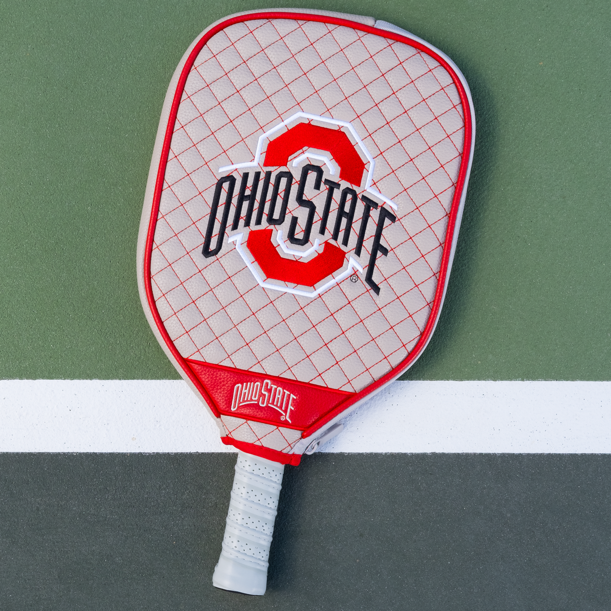 Ohio State Buckeyes Gray quilted pickleball paddle cover on court