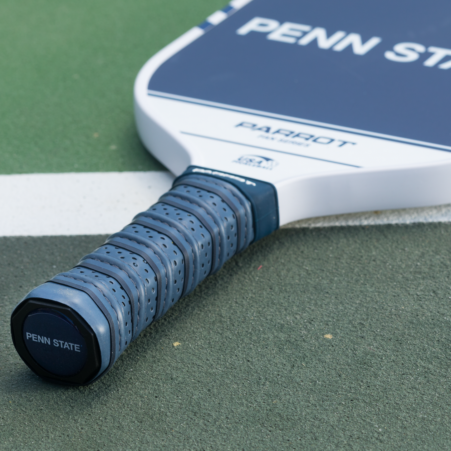Penn State Nittany Lions Sport Plus pickleball paddle on the court