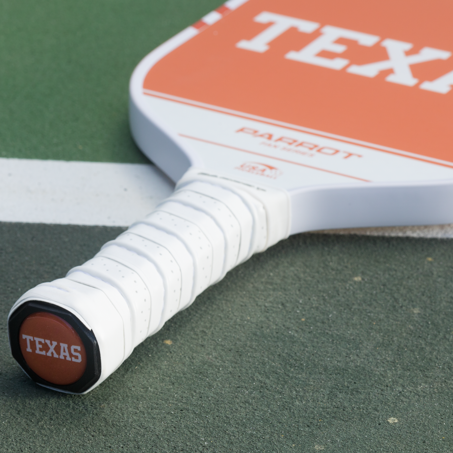 Texas Longhorns Sport Plus pickleball paddle on the court