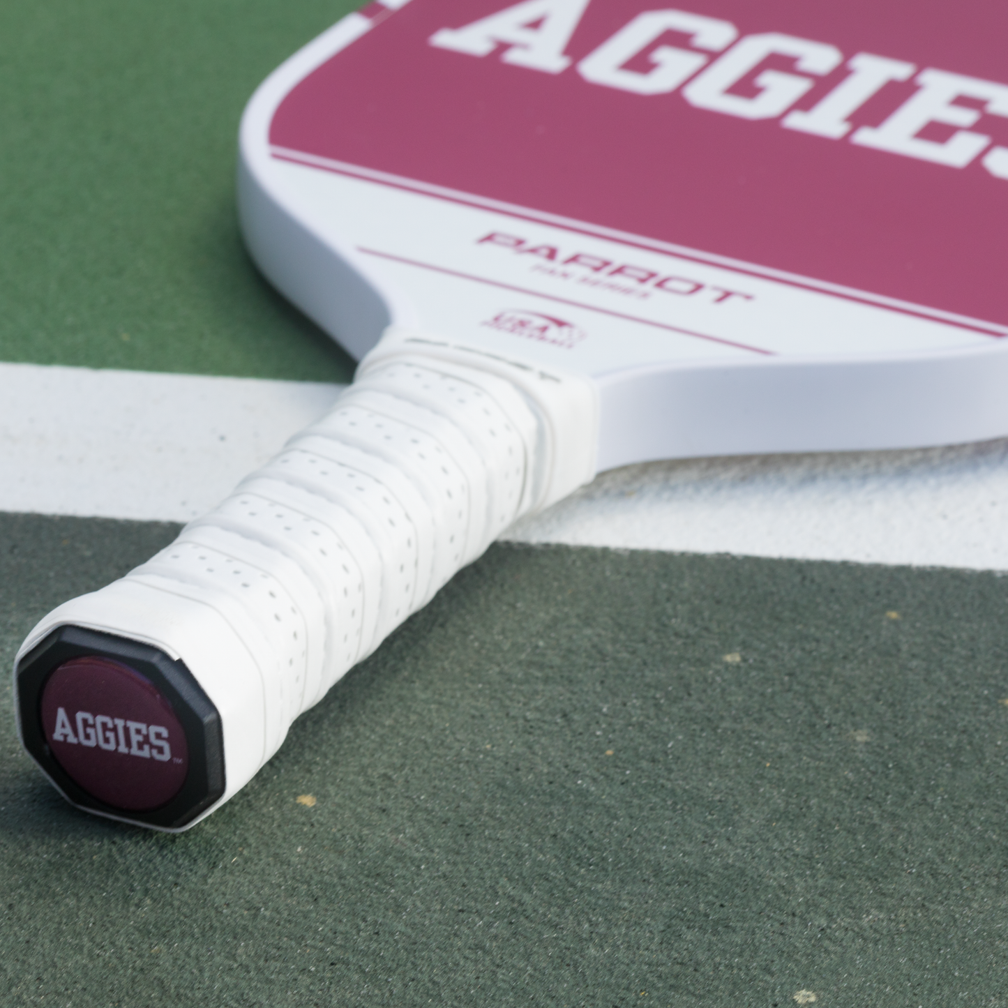 Texas A&M Aggies Sport Plus pickleball paddle on the court