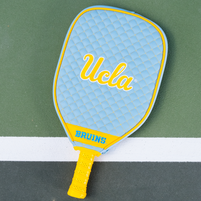 UCLA Bruins quilted pickleball paddle cover on court view