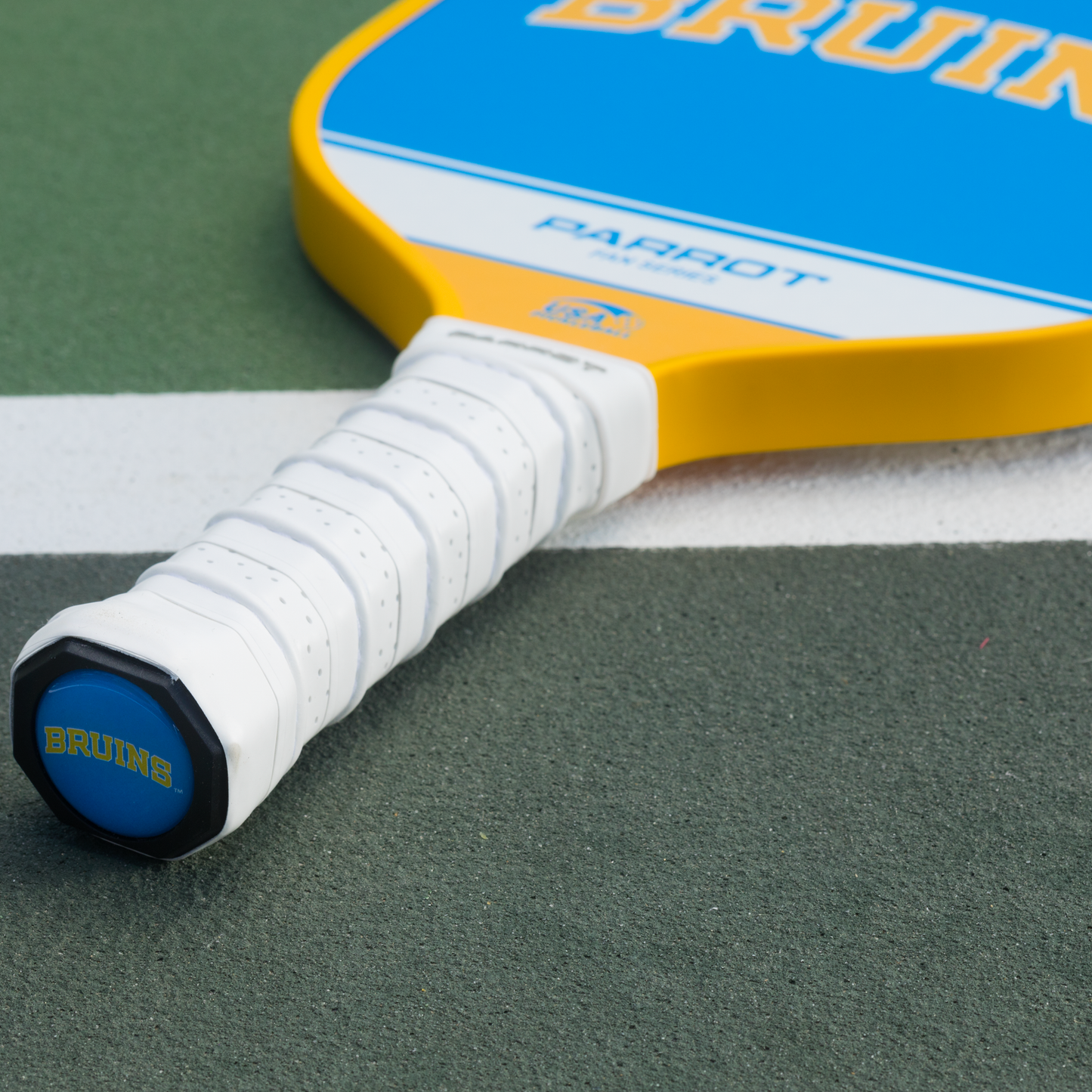 UCLA Bruins Sport Plus pickleball paddle on the court