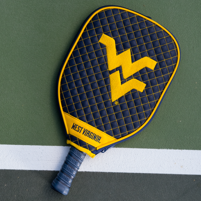 West Virginia Mountaineers quilted pickleball paddle cover on court view