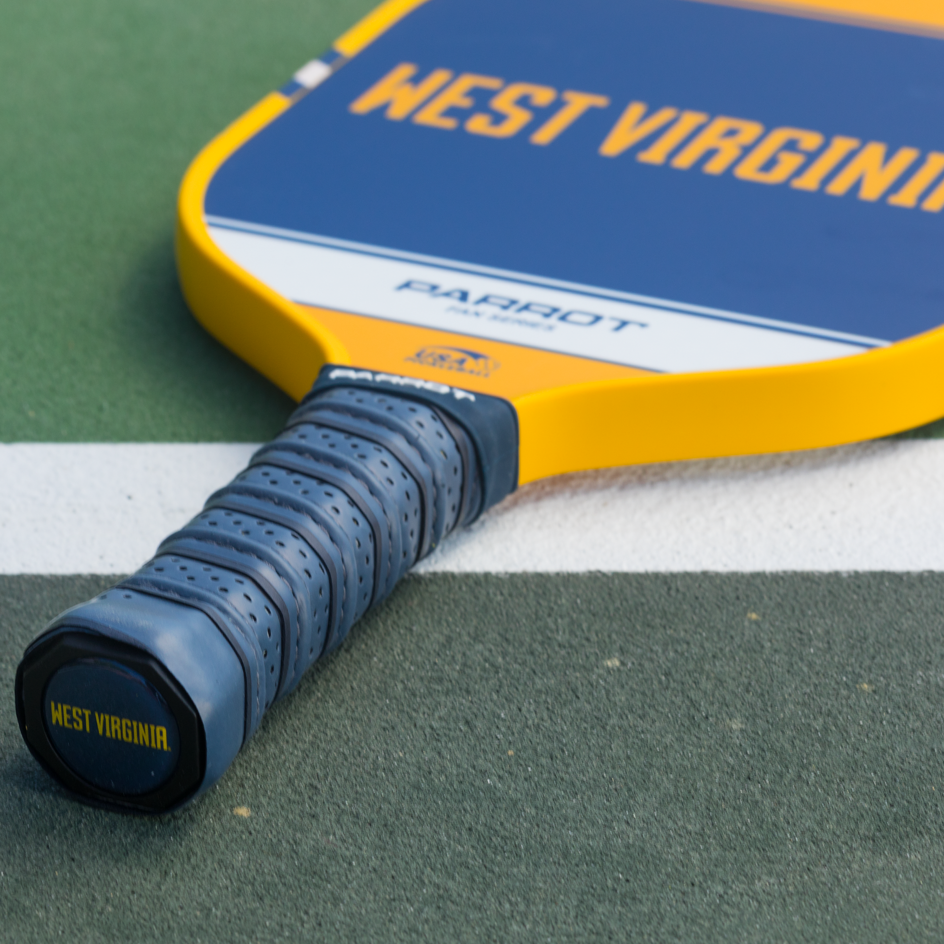 West Virginia Mountaineers Sport Plus pickleball paddle on the court