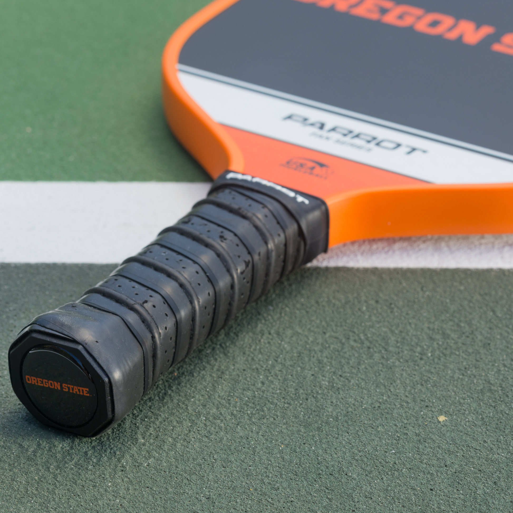 Oregon State Beavers Sport Plus pickleball paddle on the court