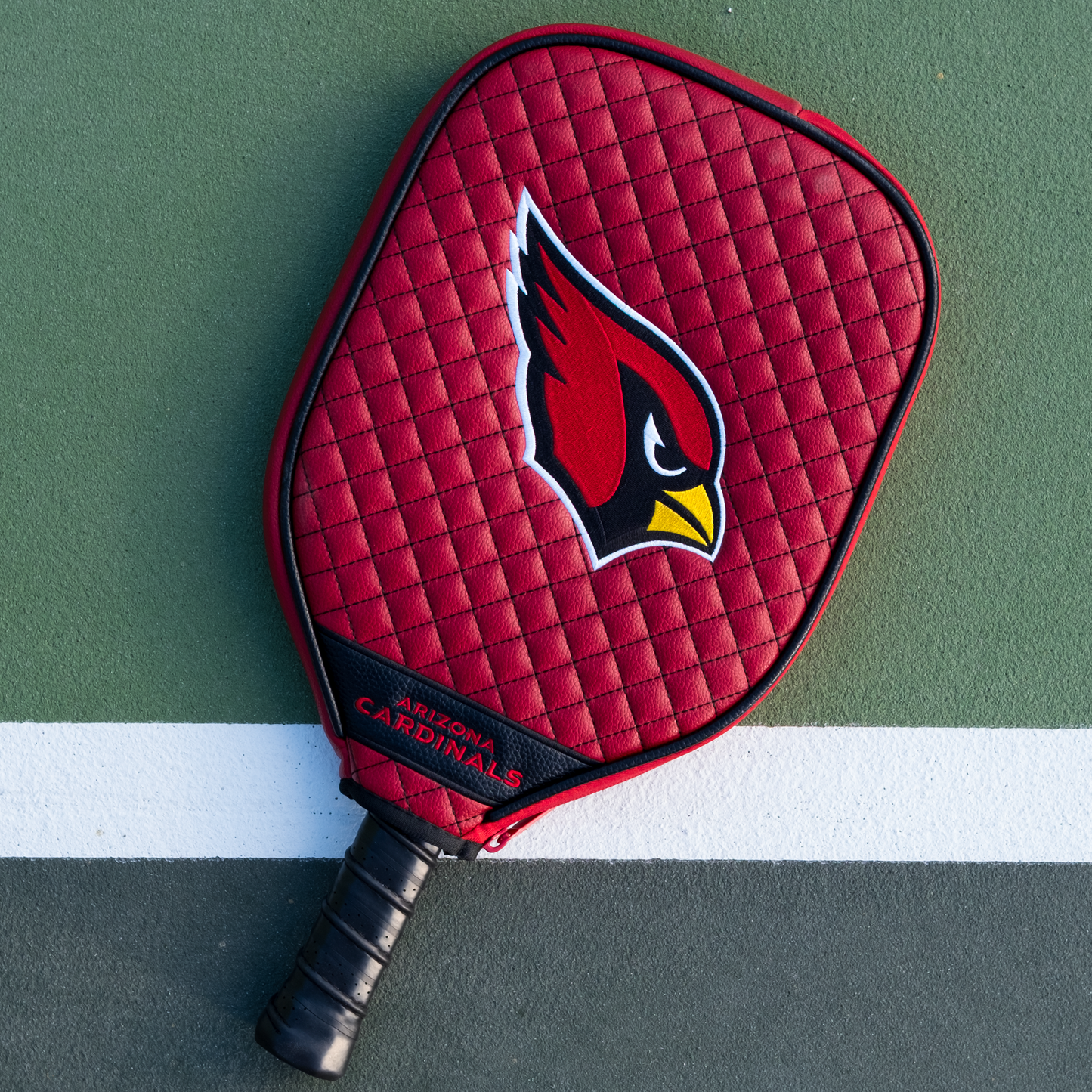 Arizona Cardinals quilted pickleball paddle cover on court view