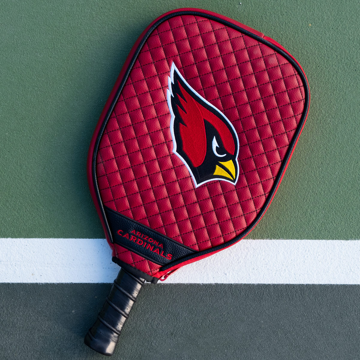 Arizona Cardinals quilted pickleball paddle cover on court view