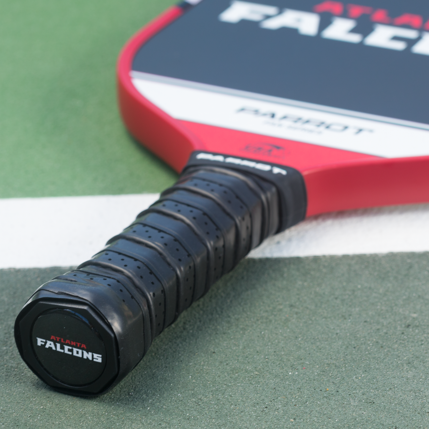 Atlanta Falcons Sport Plus pickleball paddle on the court