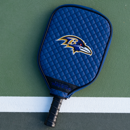 Baltimore Ravens quilted pickleball paddle cover on court view