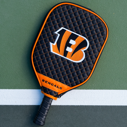 Cincinnati Bengals quilted pickleball paddle cover on court view