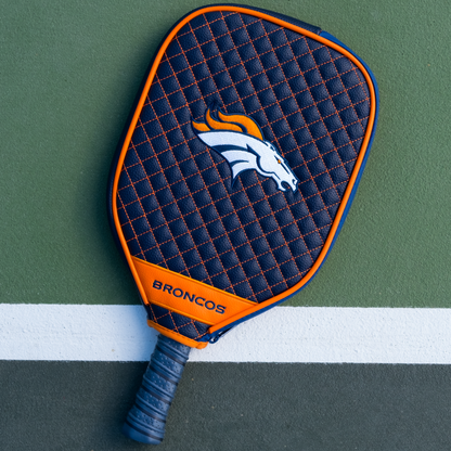 Denver Broncos Navy quilted pickleball paddle cover on court