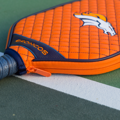 Denver Broncos Orange quilted pickleball paddle cover closeup image